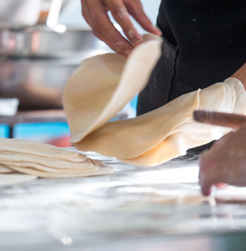 closeup-shot-of-a-chef-kneading-tortillas closeup shot of a chef kneading tortillas